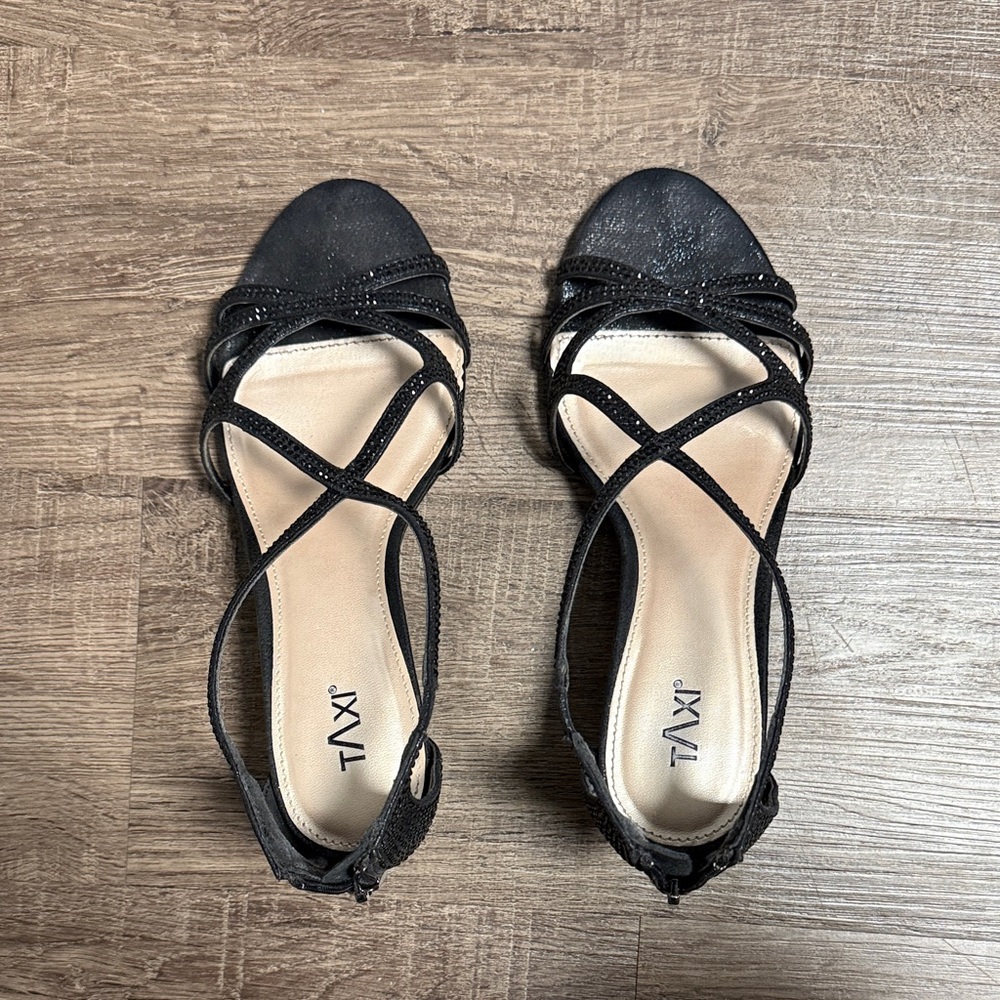 Black Crisscross Slingback Heels by Taxi